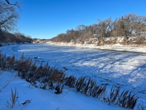 The Assiniboine River before it has totally frozen